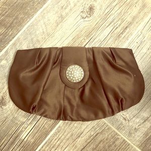 Brown clutch with rhinestone clasp